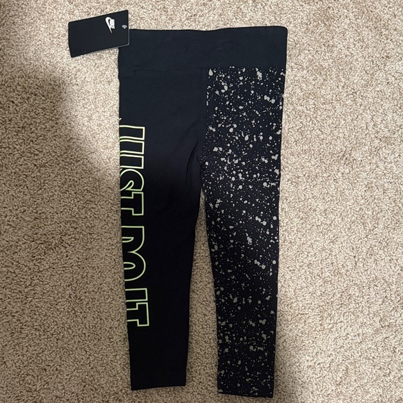 Nike Kids Black Leggings with White Speckles and Neon Green Logo - Picture 4 of 5